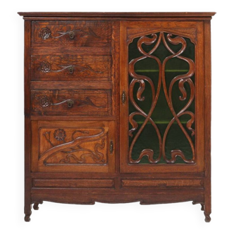 Remarquable armoire Art Nouveau en chêne avec porte vitrée verte et décor floral, France, 1910