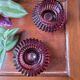 Lot de 2 bougeoirs en verre violet
