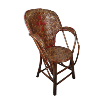 Vintage braided chestnut armchair