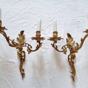 Pair of vintage French wall sconces in bronze, Louis XV Rococo style.