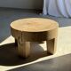 Coffee table, four-legged low table in natural solid monoxyle mango wood.