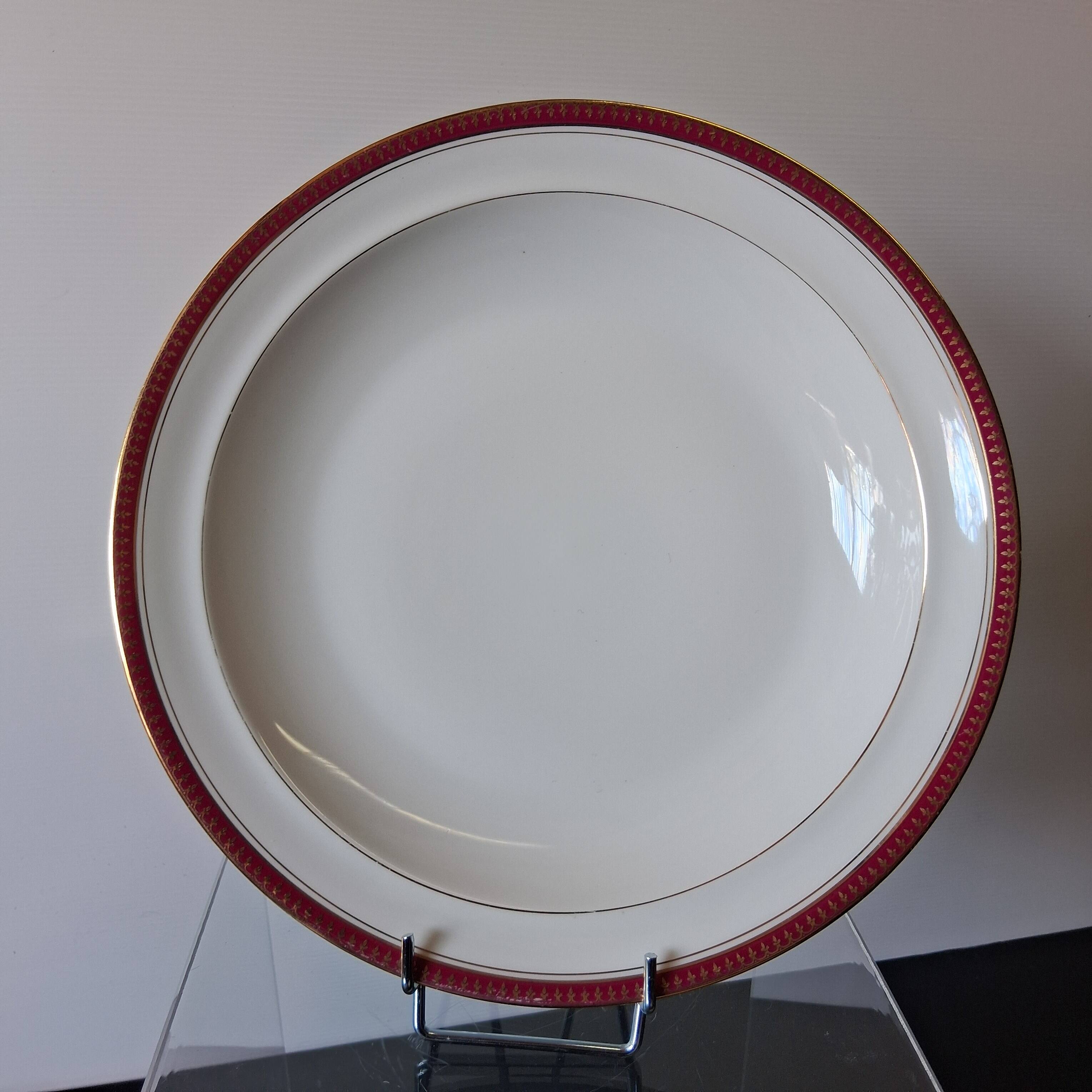 Round hollow serving plate in porcelain from Chastagner et Cie in good condition.