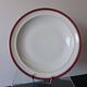 Round hollow serving plate in porcelain from Chastagner et Cie in good condition.