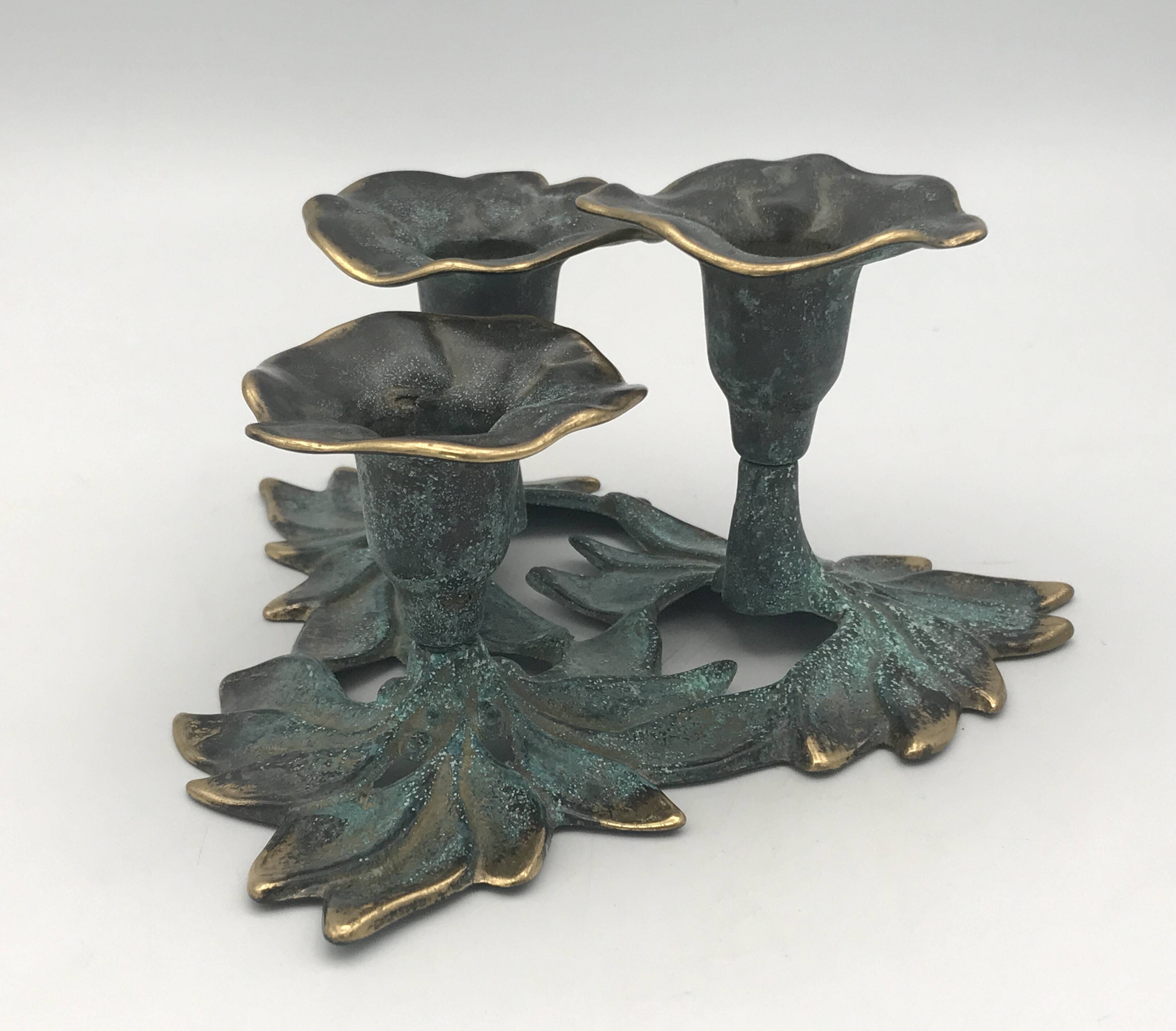 3-flower brass candlestick with green patina