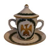 Porcelain cup of snake in the colors of Napoleon with its saucer and lid
