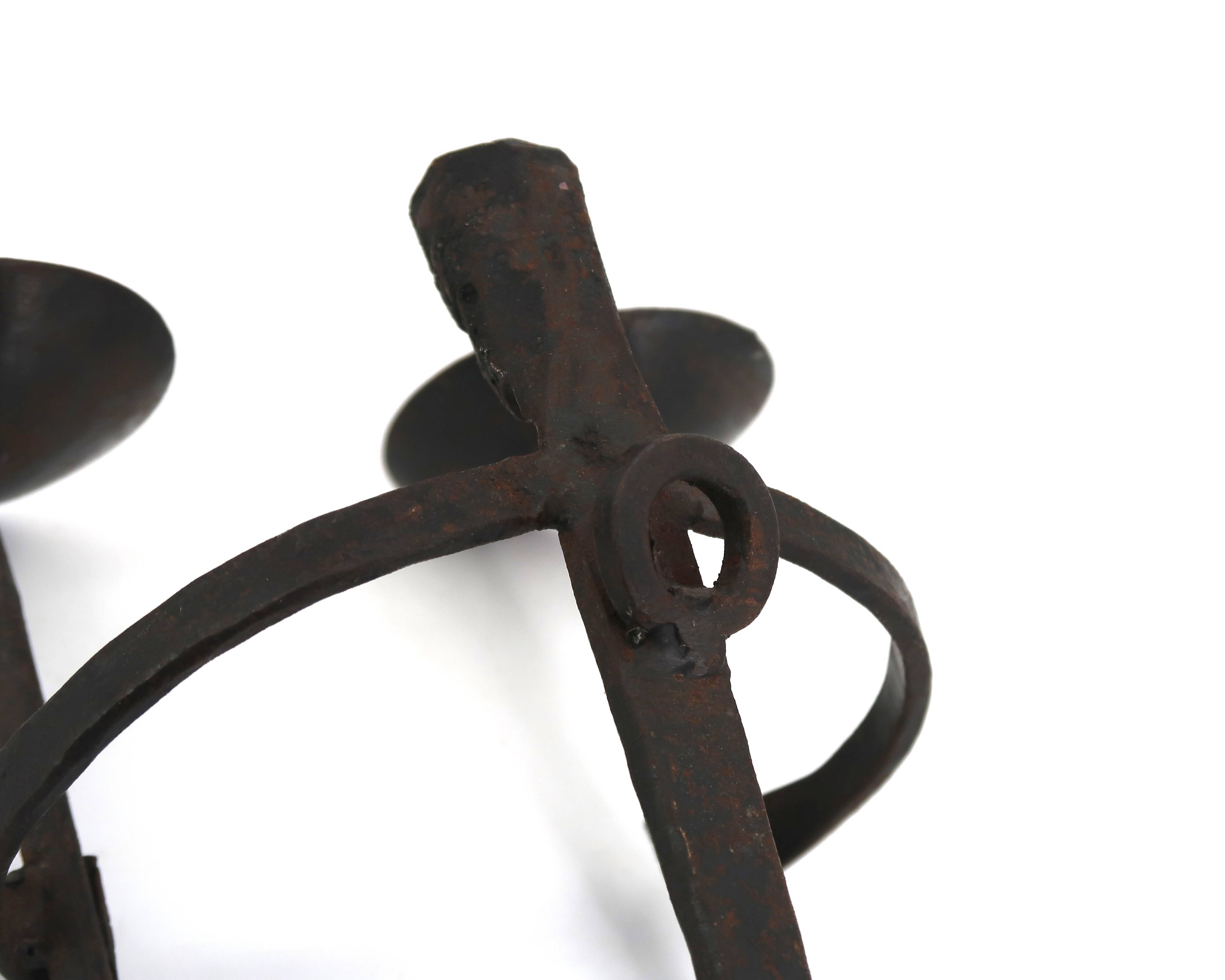 Anthropomorphic wall candle holder in wrought iron, 1950s.