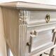 Grey patinated bedside table with marble top