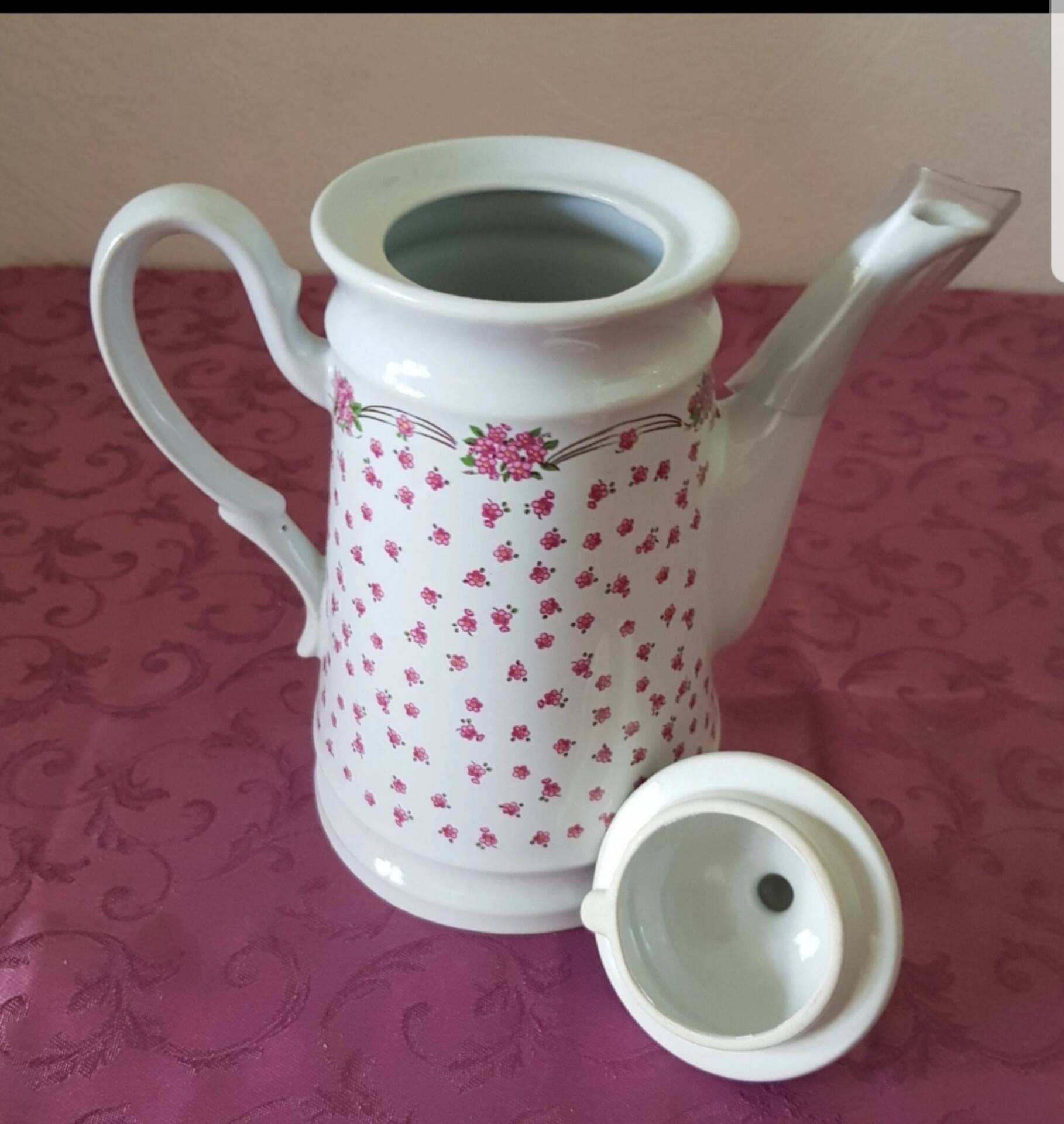 Flowered teapot, made in Korea.