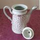 Flowered teapot, made in Korea.