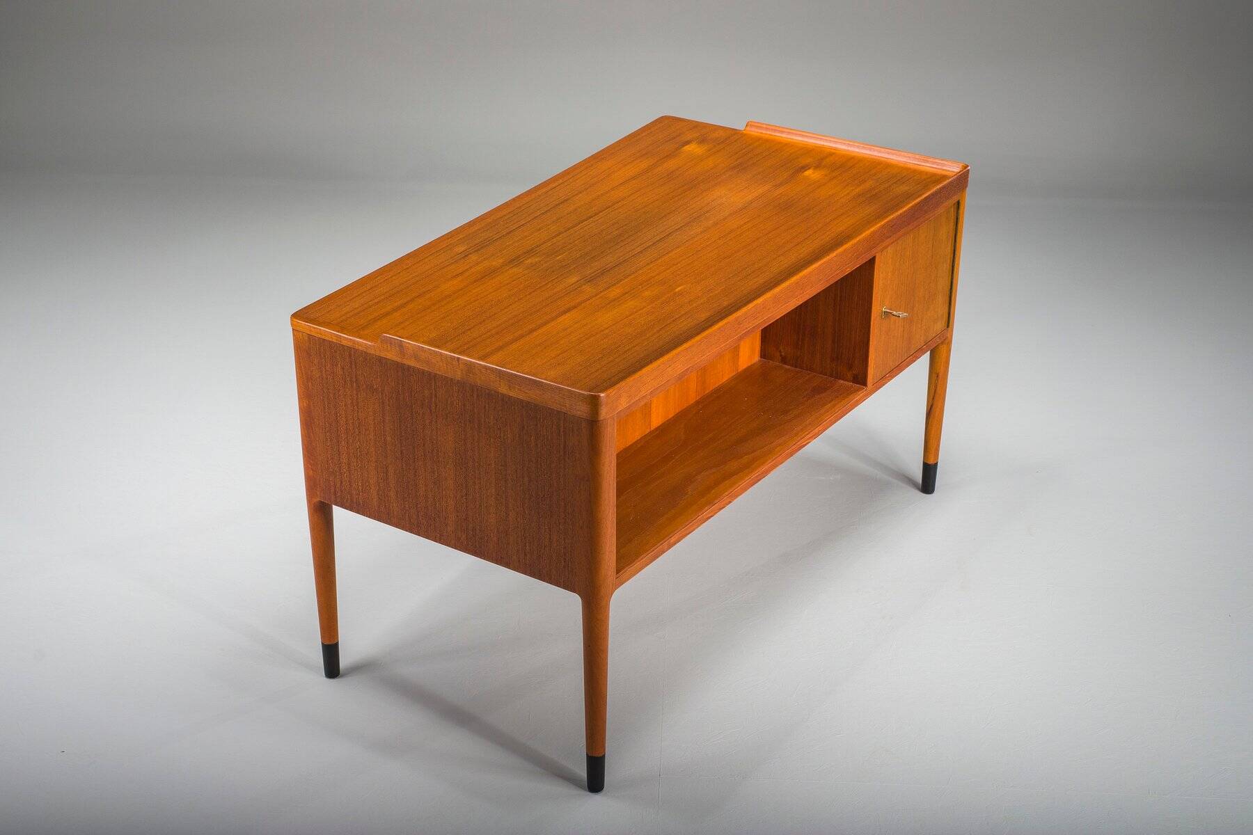 Scandinavian modern teak writing desk attributed to H. Brockmann Petersen for Poul M. Jessen, 1960s