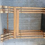 Sets of three nesting tables with painted landscape decorations in poplar.