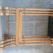 Sets of three nesting tables with painted landscape decorations in poplar.