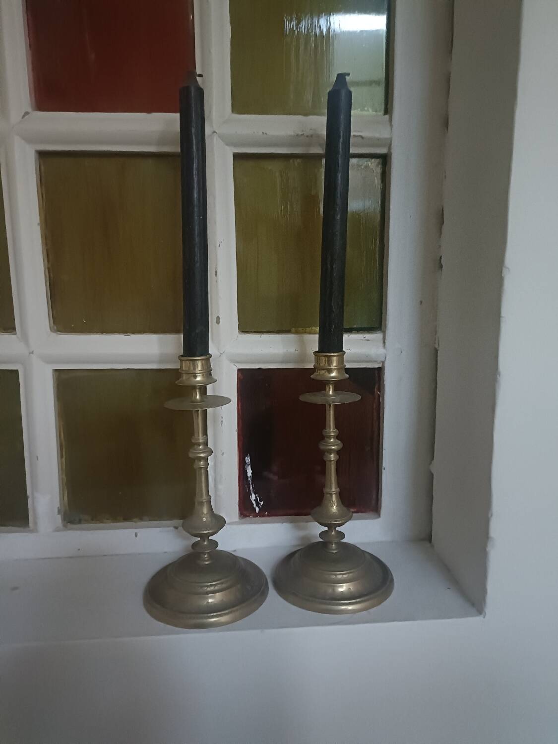 Pair of chiselled candlesticks