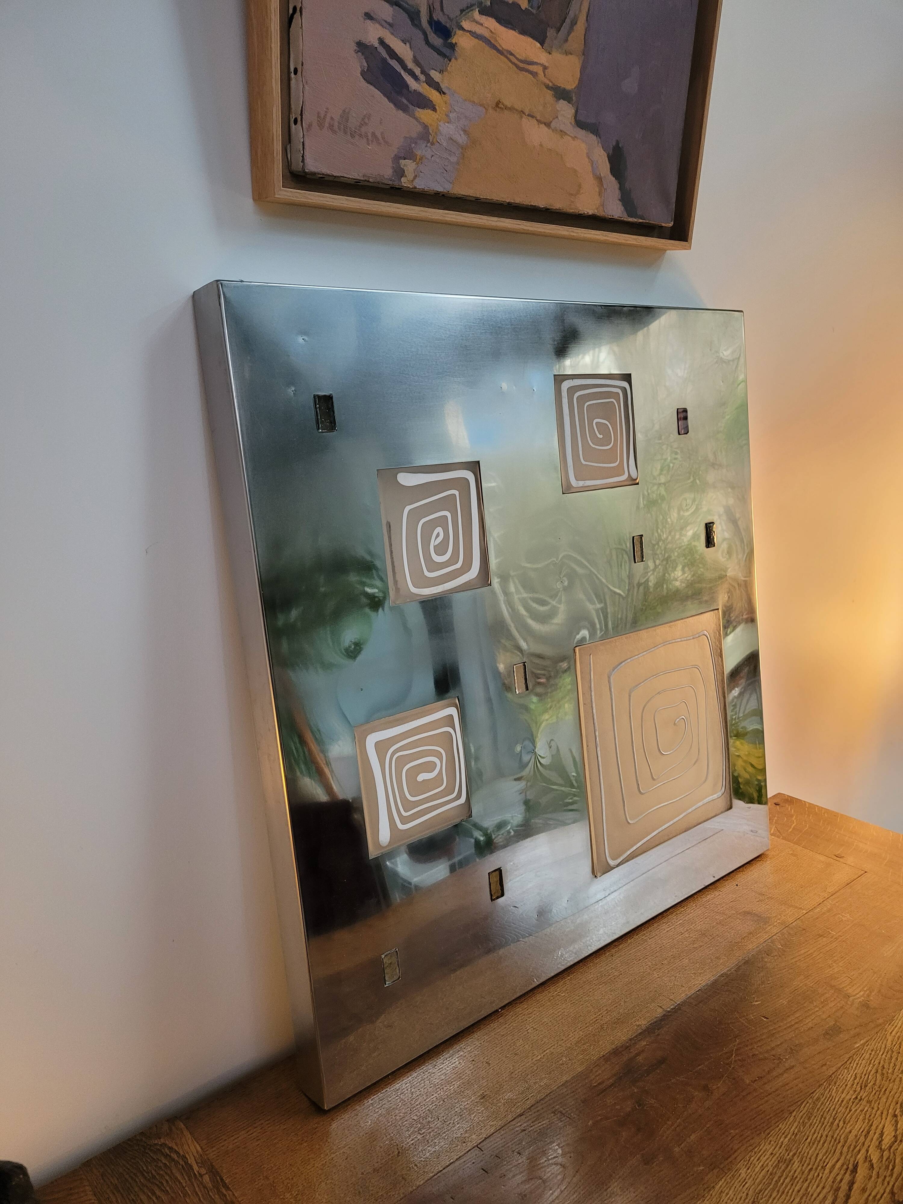 Wall light by Angelo Brotto, polished steel and Murano glass.