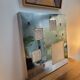 Wall light by Angelo Brotto, polished steel and Murano glass.