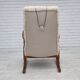 1970s, Danish rocking chair, reupholstered in quality genuine sheepskin.