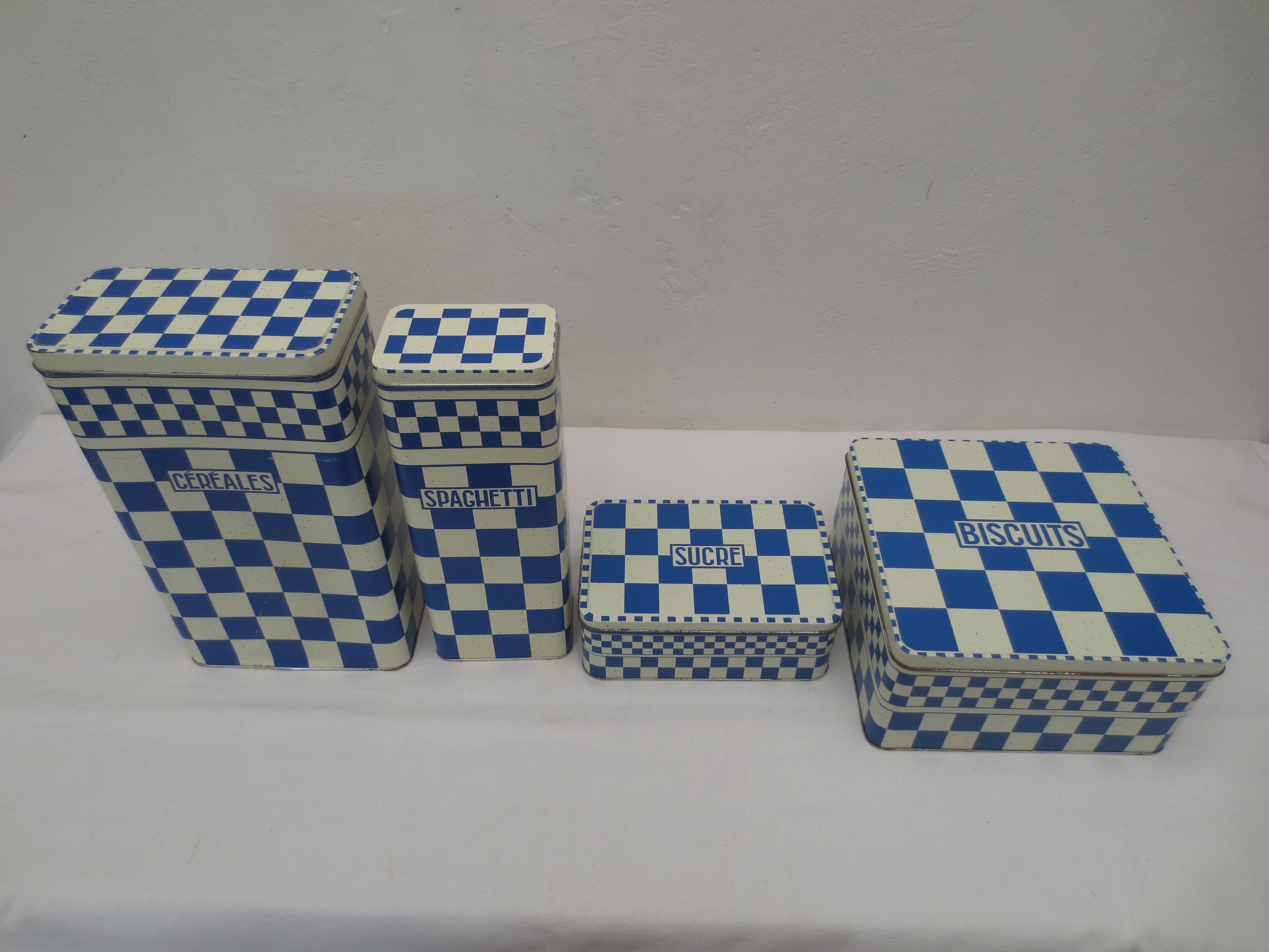 Series of 4 metal boxes, blue and white lustucru decoration