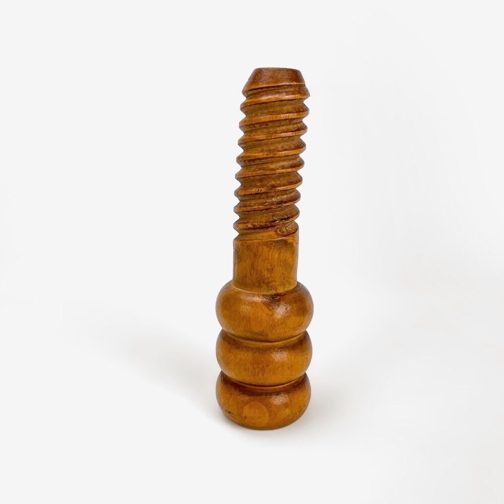 Old nutcracker with turned wooden screws
