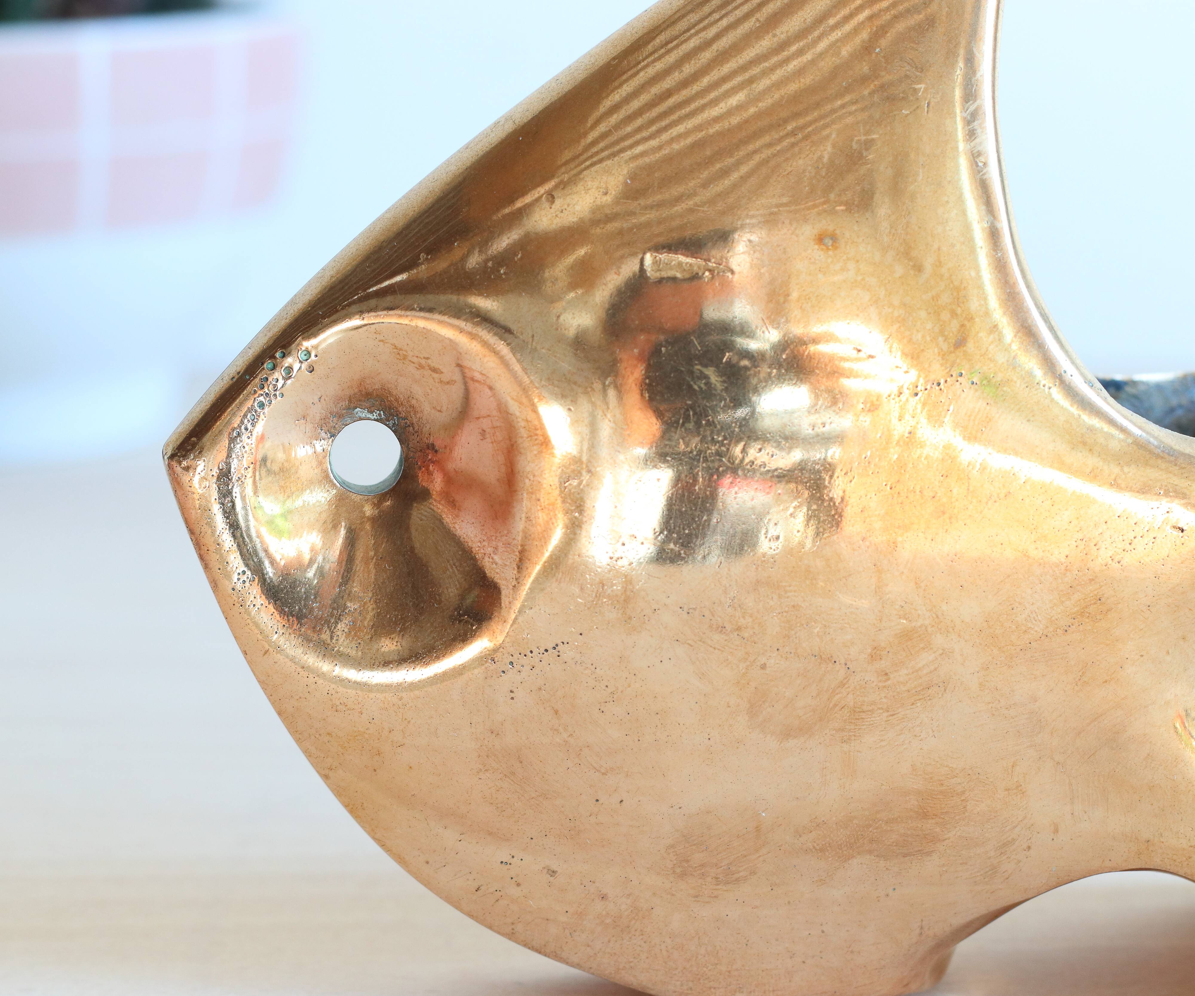 1960s solid brass ashtray in the shape of a stylized fish