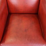 Set of 2 red-colored design armchairs made of sheepskin leather