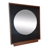 Scandinavian mirror with wooden frame and backlighting.