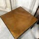Pair of side tables in black and gold lacquer