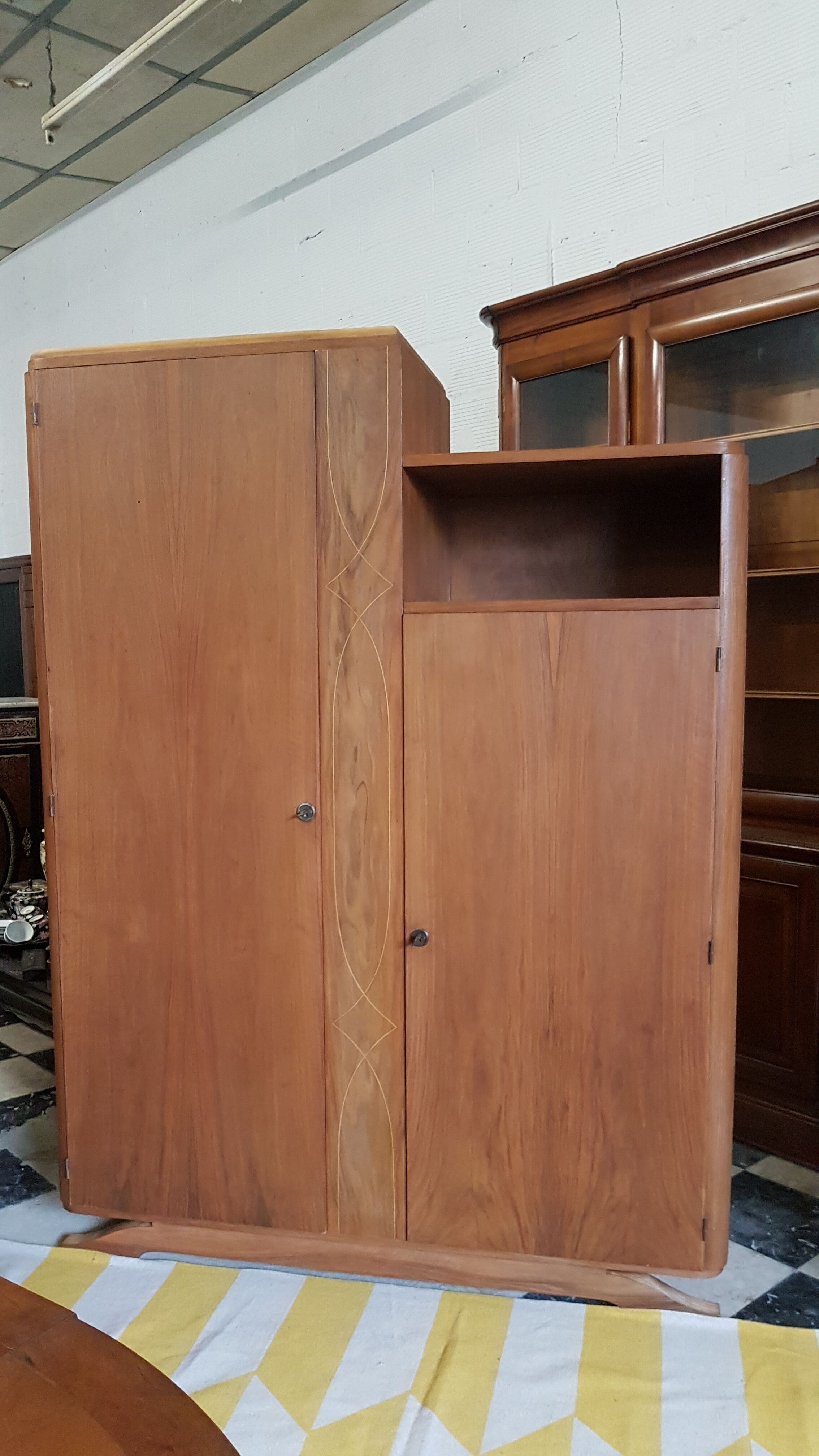 Asymmetrical art deco cabinet
