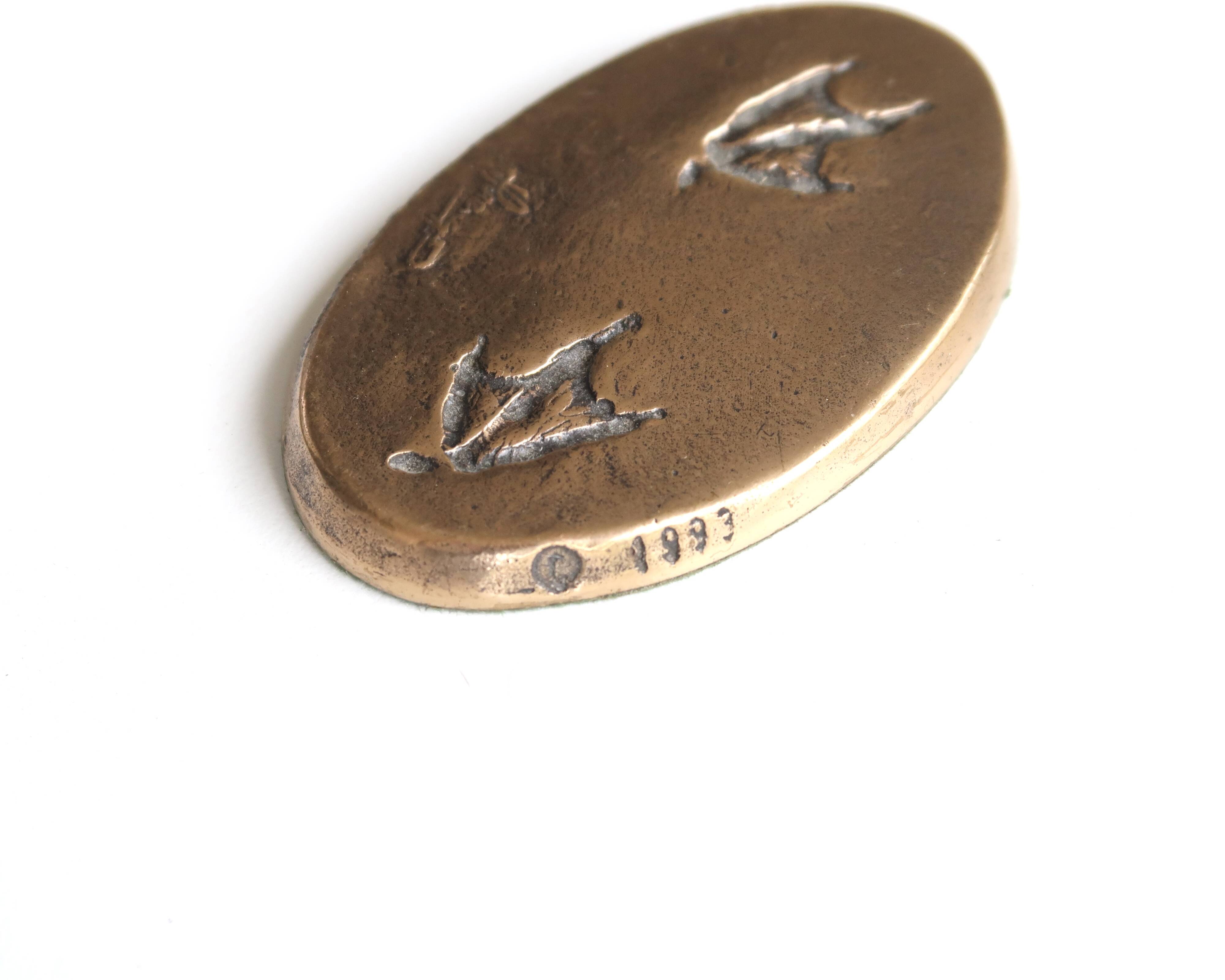 Signed bronze paperweight, 1993