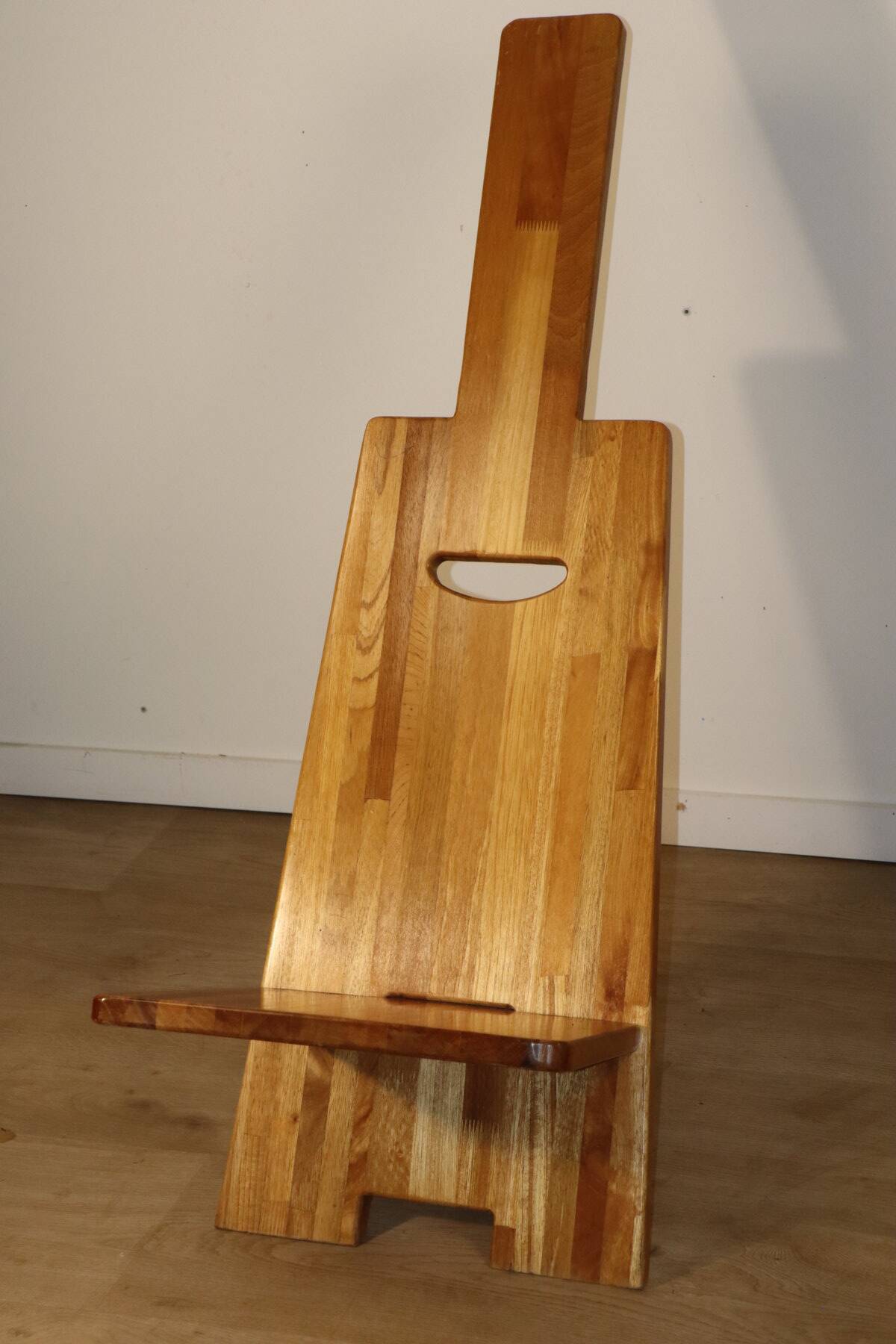 Sculptural brutalist armchair in solid elm, 1980.
