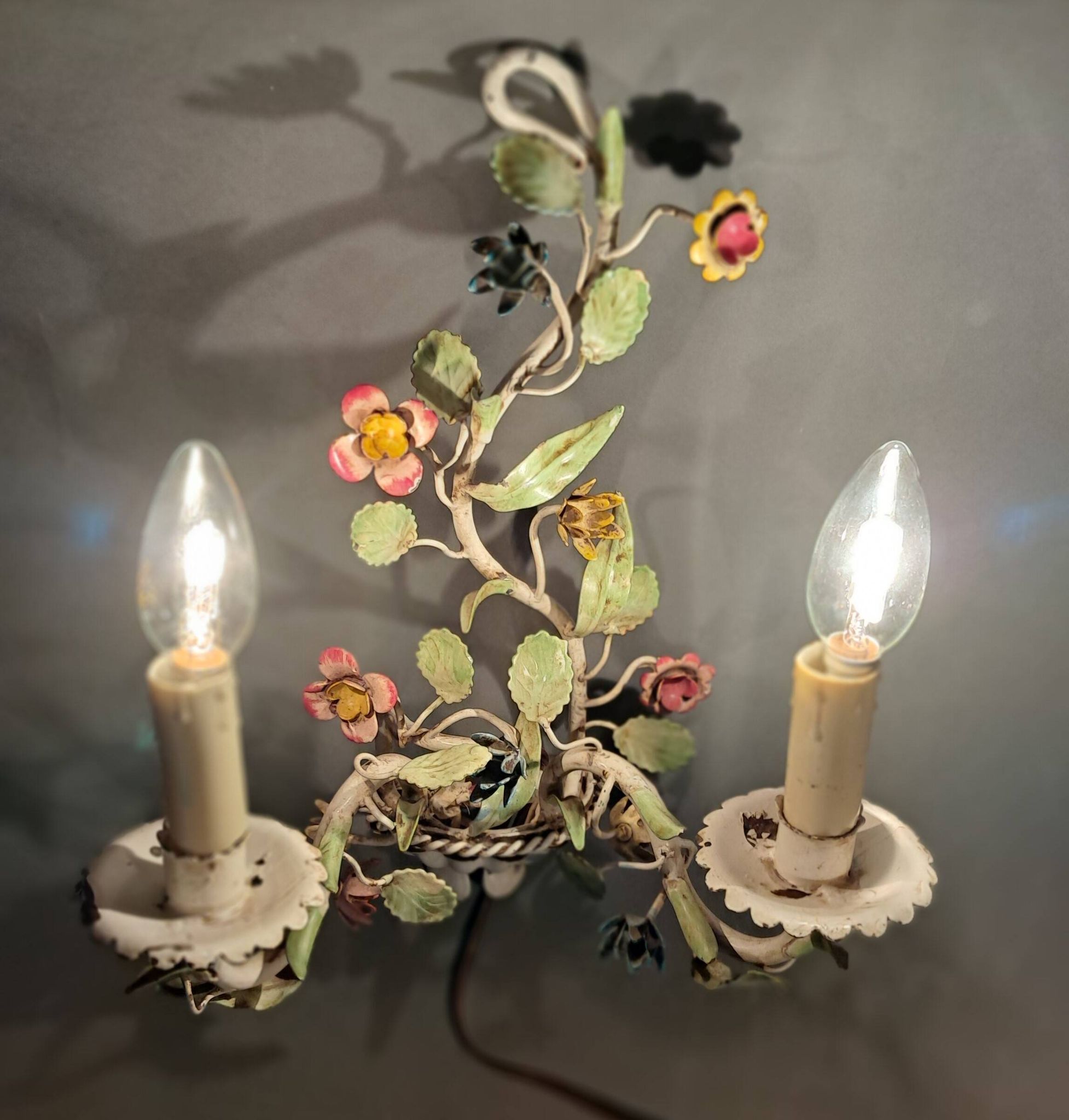 Two-light polychrome painted wrought iron wall lights, Italy 1950/1960.