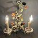 Two-light polychrome painted wrought iron wall lights, Italy 1950/1960.