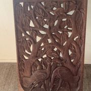 Chaise vintage à palabre en bois sculpté