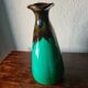 Green and brown ceramic vase