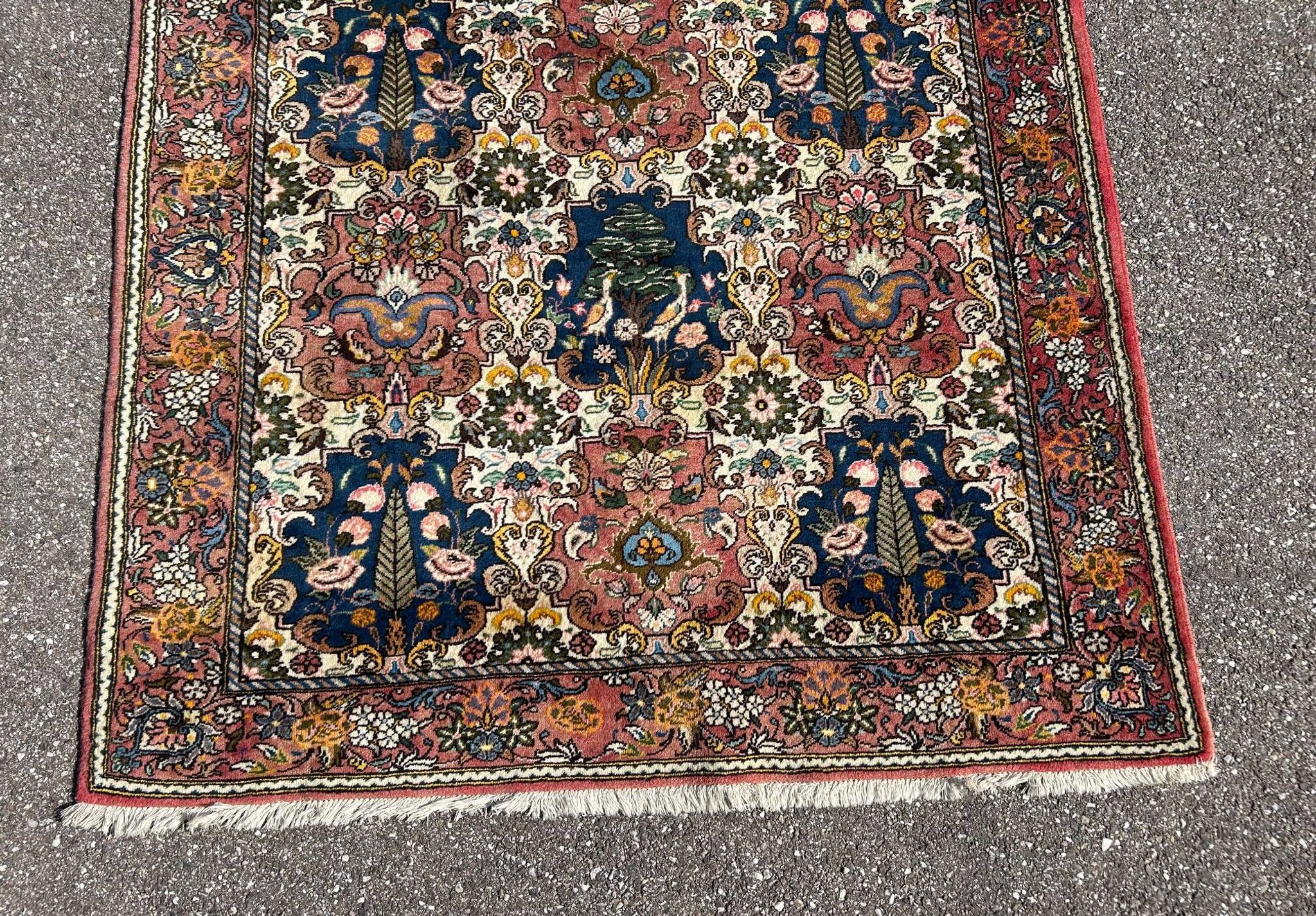 tapis d'orient à décor d'oiseaux 150/205cm