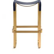 Contemporary kitchen bar stool in aged brass metal and navy blue leather.