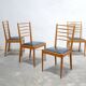 Series of 4 vintage chairs in wood and skaï