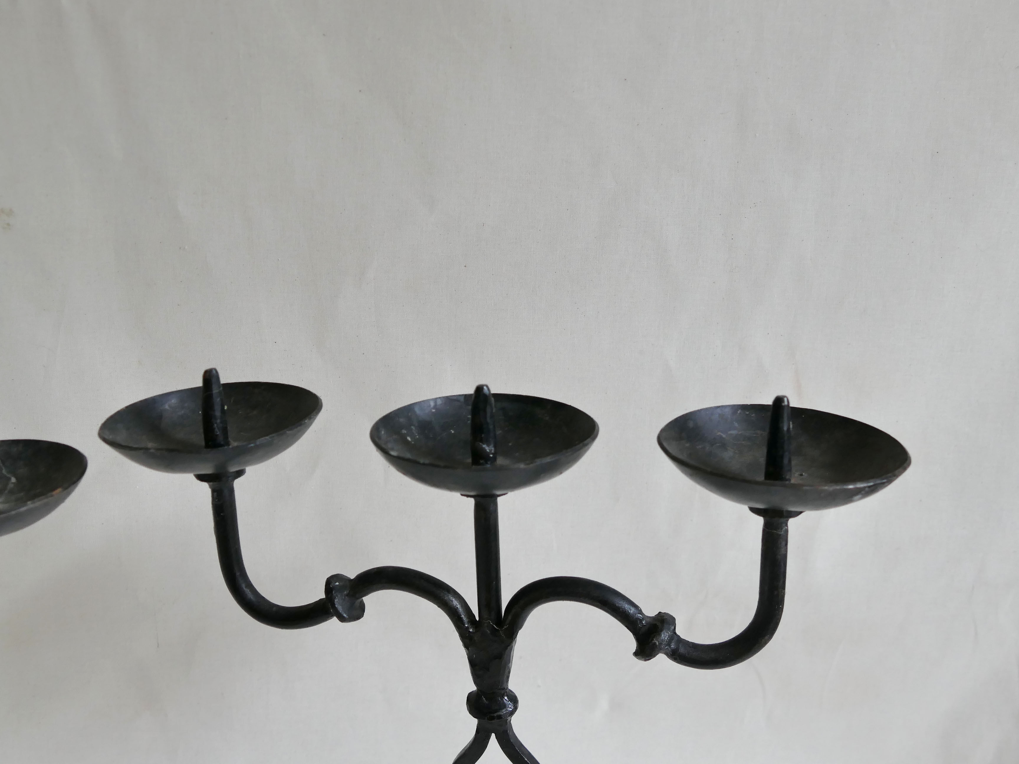 Pair of antique wrought iron chandeliers