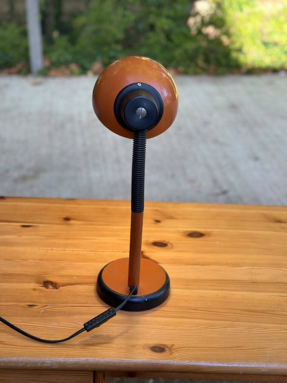 Vintage 70s desk lamp with a swan neck in terracotta and black, space age style.