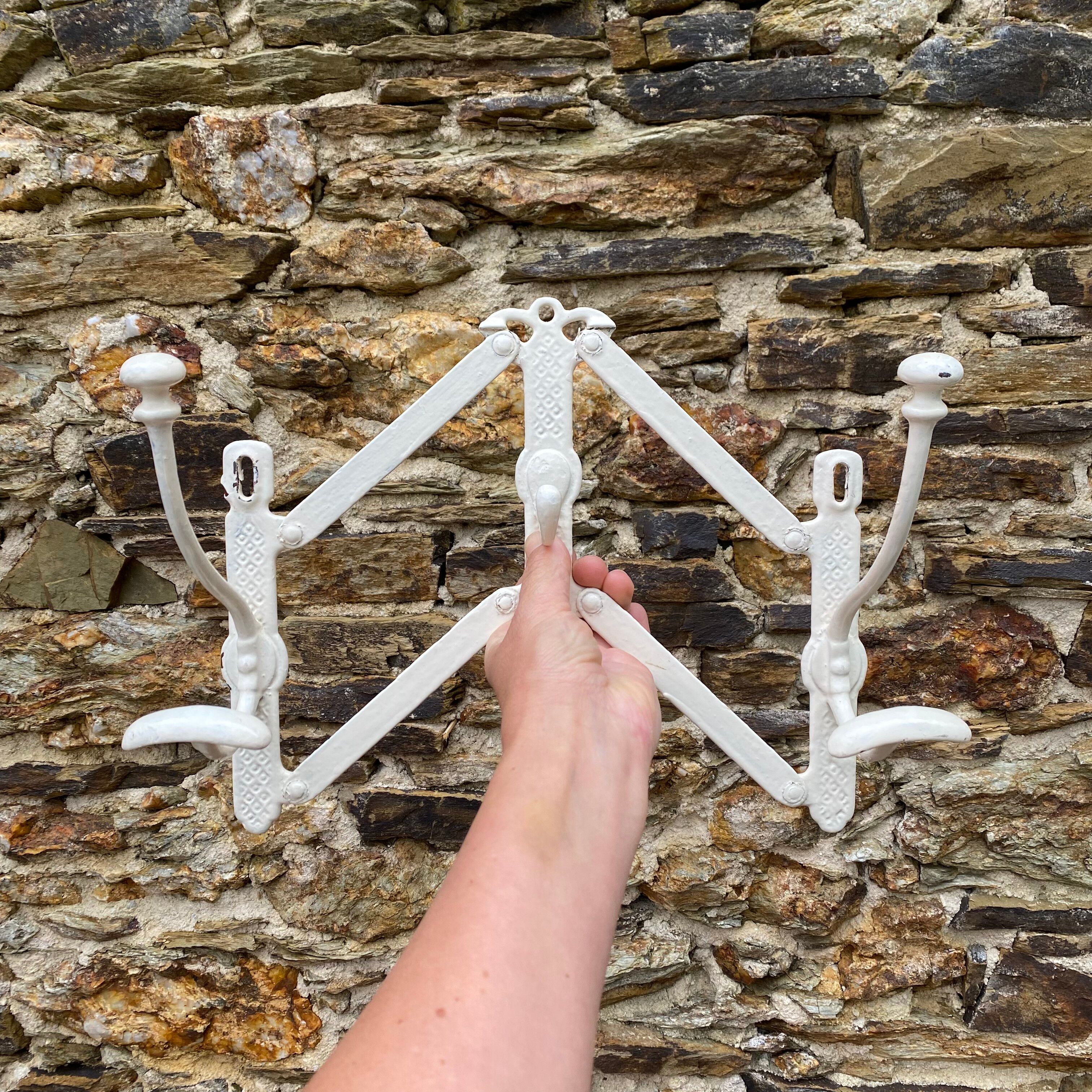 Antique wall-mounted coat rack