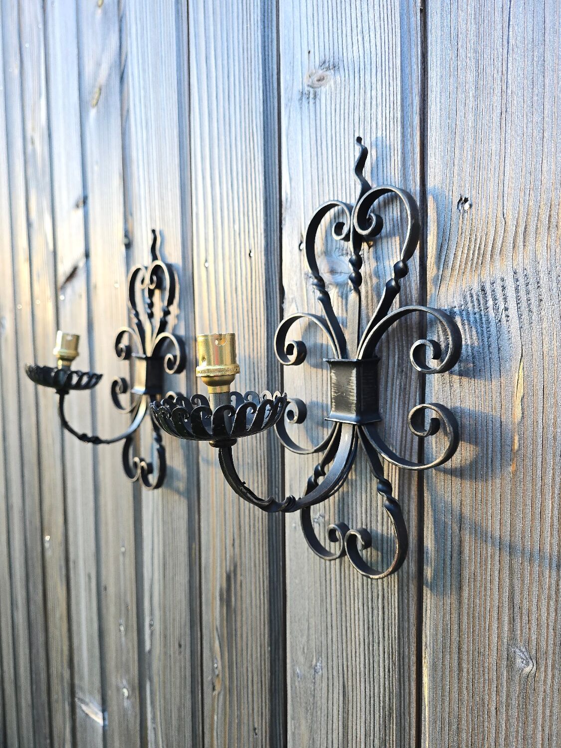 Pair of wrought iron wall sconces
