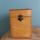 Wooden storage box, empty pocket