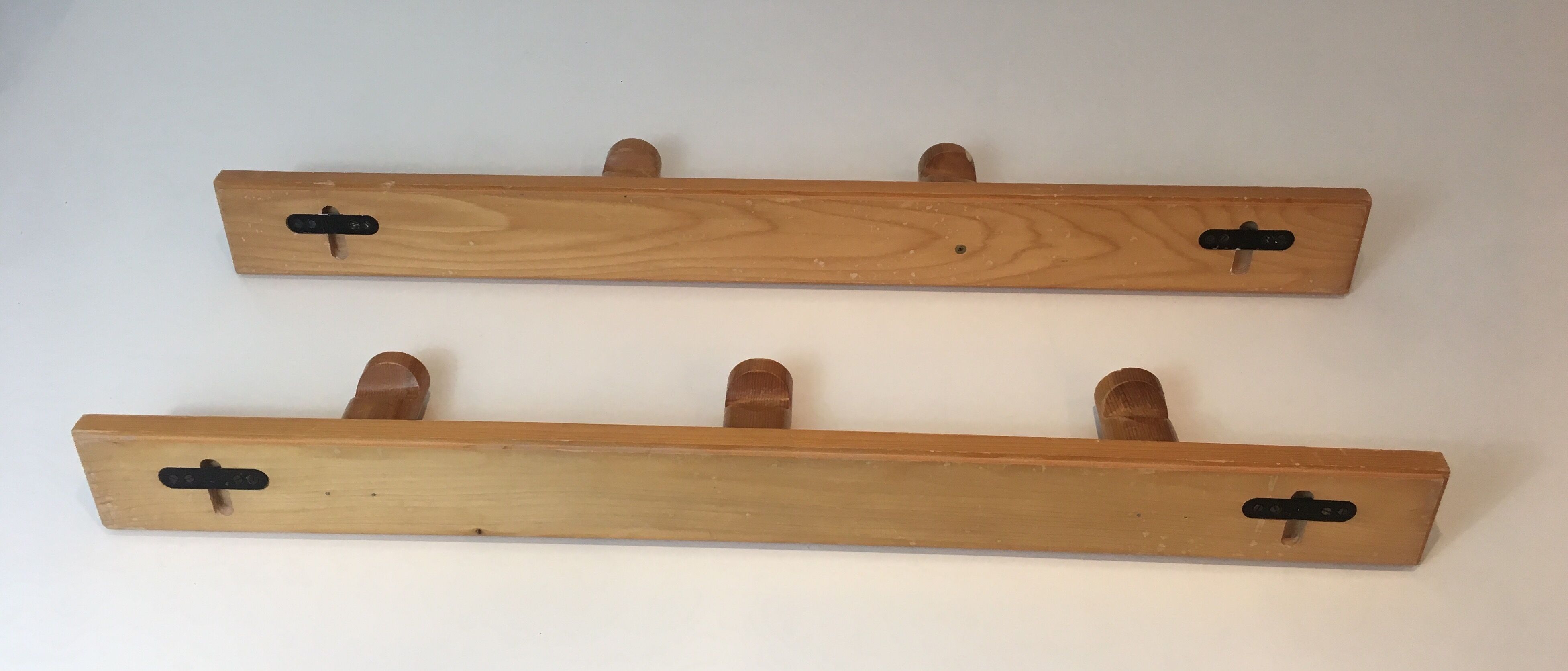 Charlotte Perriand, pair of fir wall coat racks, French work, around 1970