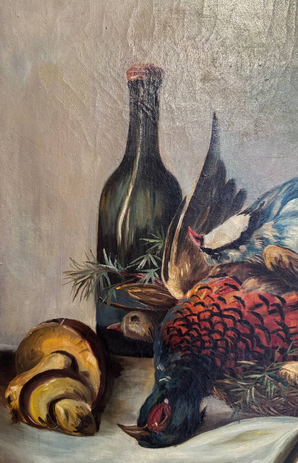 Still life with bottle and game, signed, 20th century
