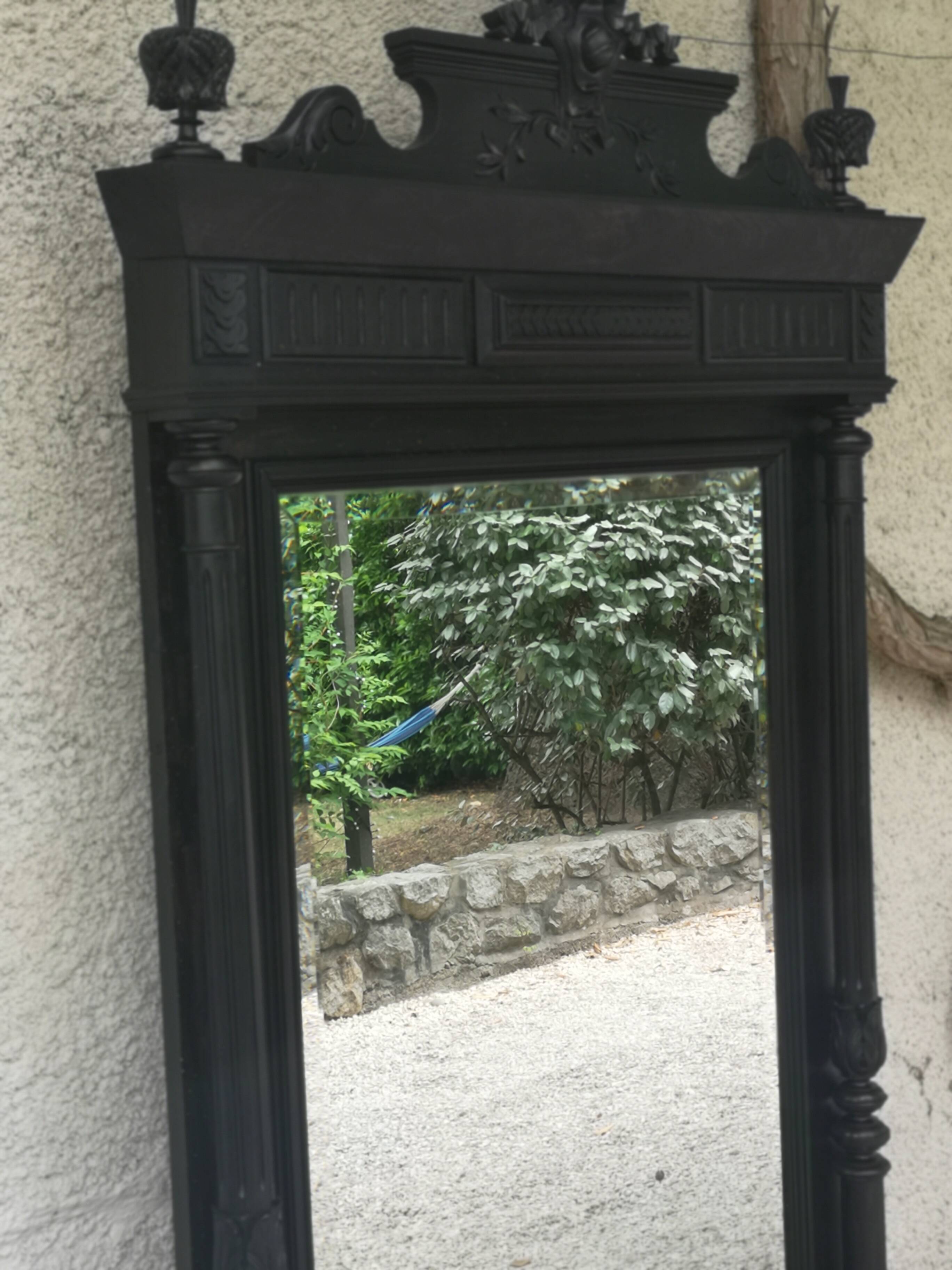 Trumeau mirror in blackened wood 19th