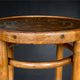 Antique high bistro stool in curved wood with a floral decorated top, Thonet style – around 1900