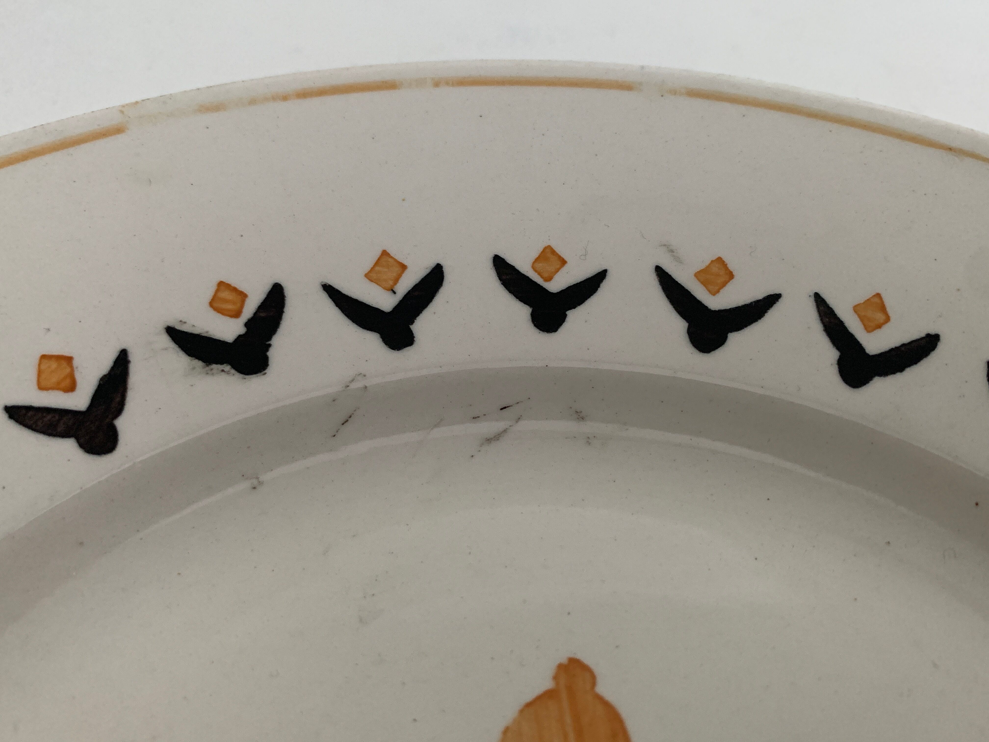7 dessert plates and one Longwy dish