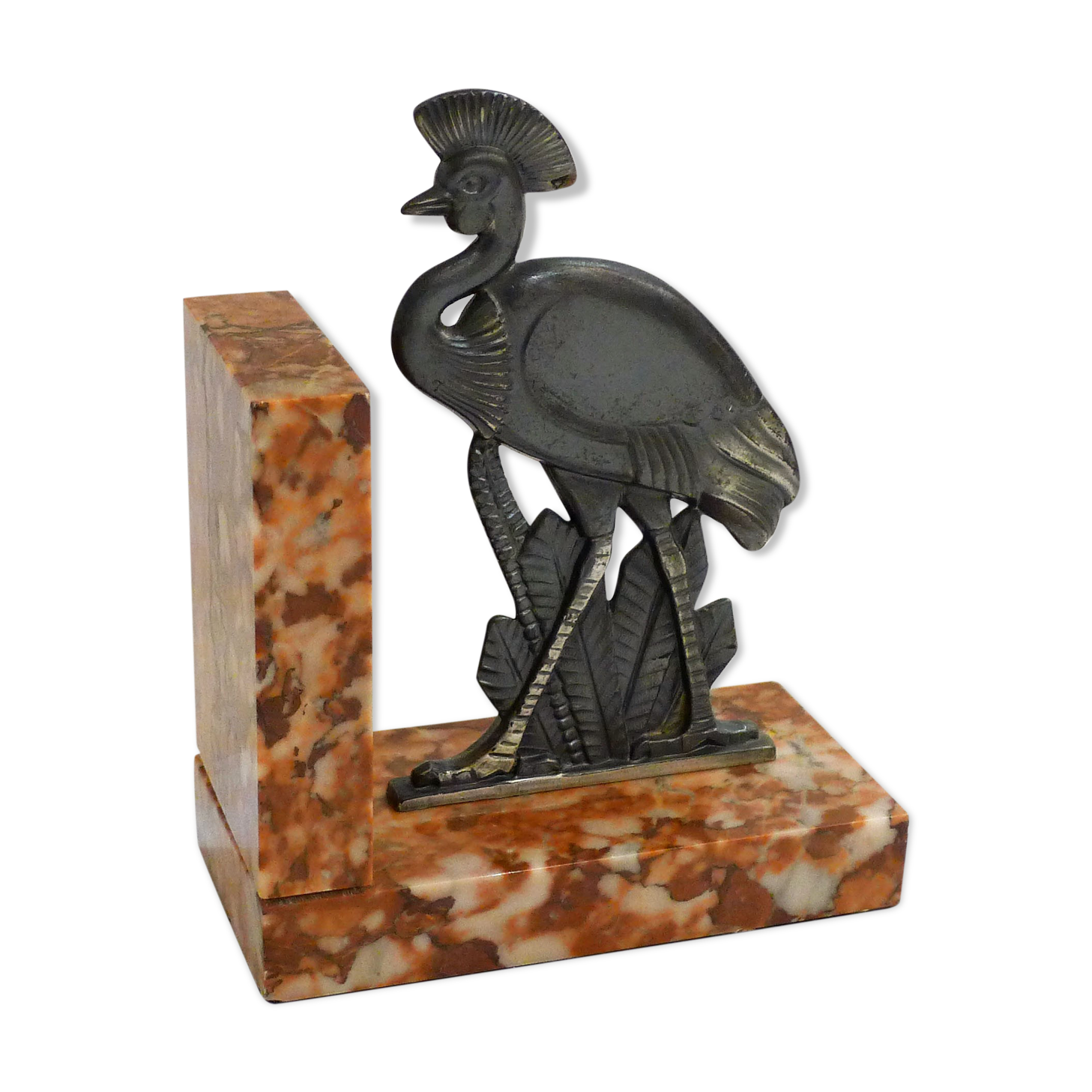 Art Deco bird bookend on marble