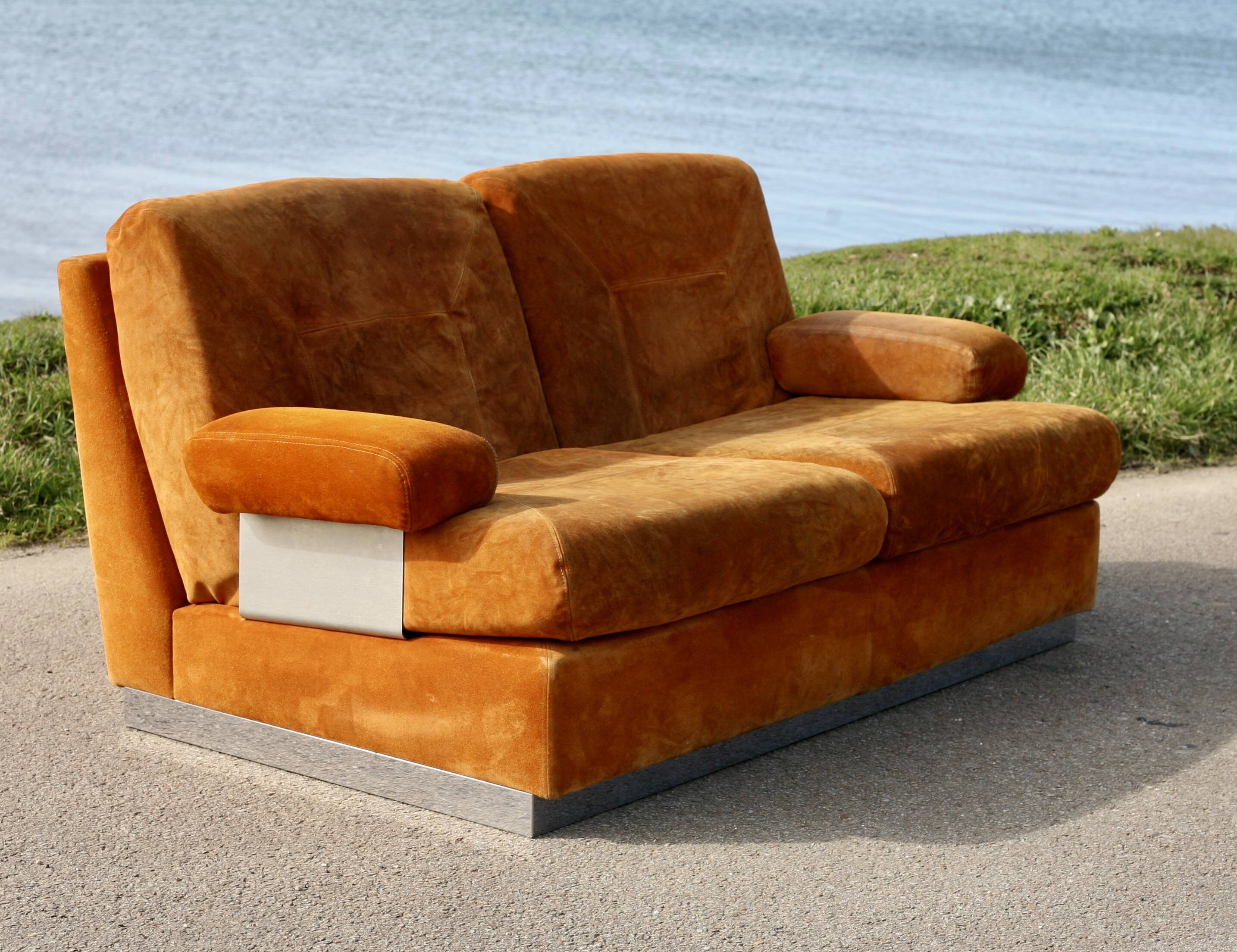 Orange suede leather and steel sofa. Circa 1970