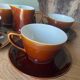 Set of 4 large cups + saucers + milk jug