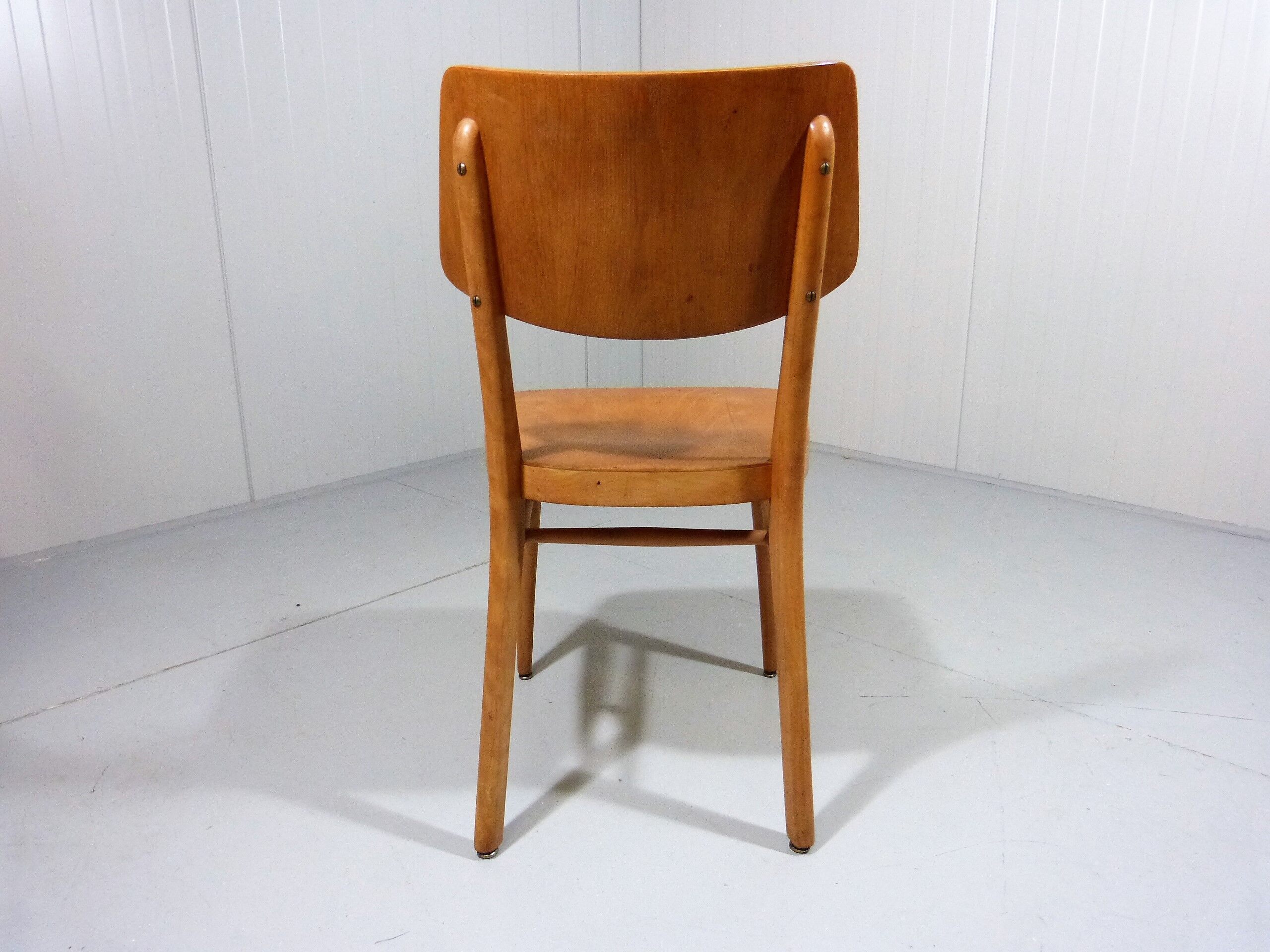 Set of 8 wooden dining chairs 1950’s